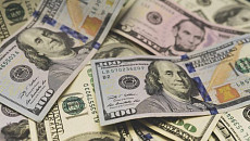 Центробанк Узбекистана снова поднял официальный курс доллара