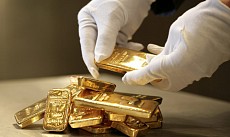 Цена на золото по итогам вечернего межбанковского фиксинга в Лондоне в пятницу повысилась