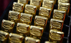 Цена на золото по итогам вечернего межбанковского фиксинга в Лондоне в среду повысилась