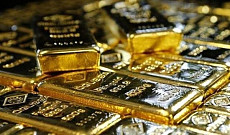 Цена на золото по итогам вечернего межбанковского фиксинга в Лондоне в четверг повысилась